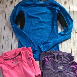Under Armour 3 pc lot of tops in a size large.